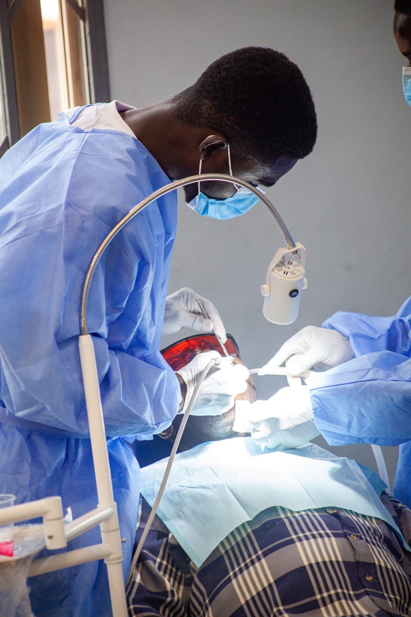 A dental check-up offered at a Women of the Kingdom medical outreach